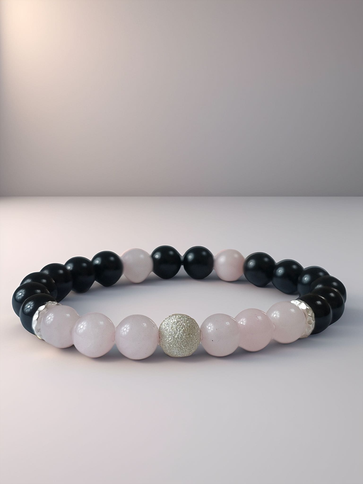 Le Souffle du Diamant : Les Rois du Vide et de la Pierre Noctua Rosaria Quartz Rose bracelet 1 min