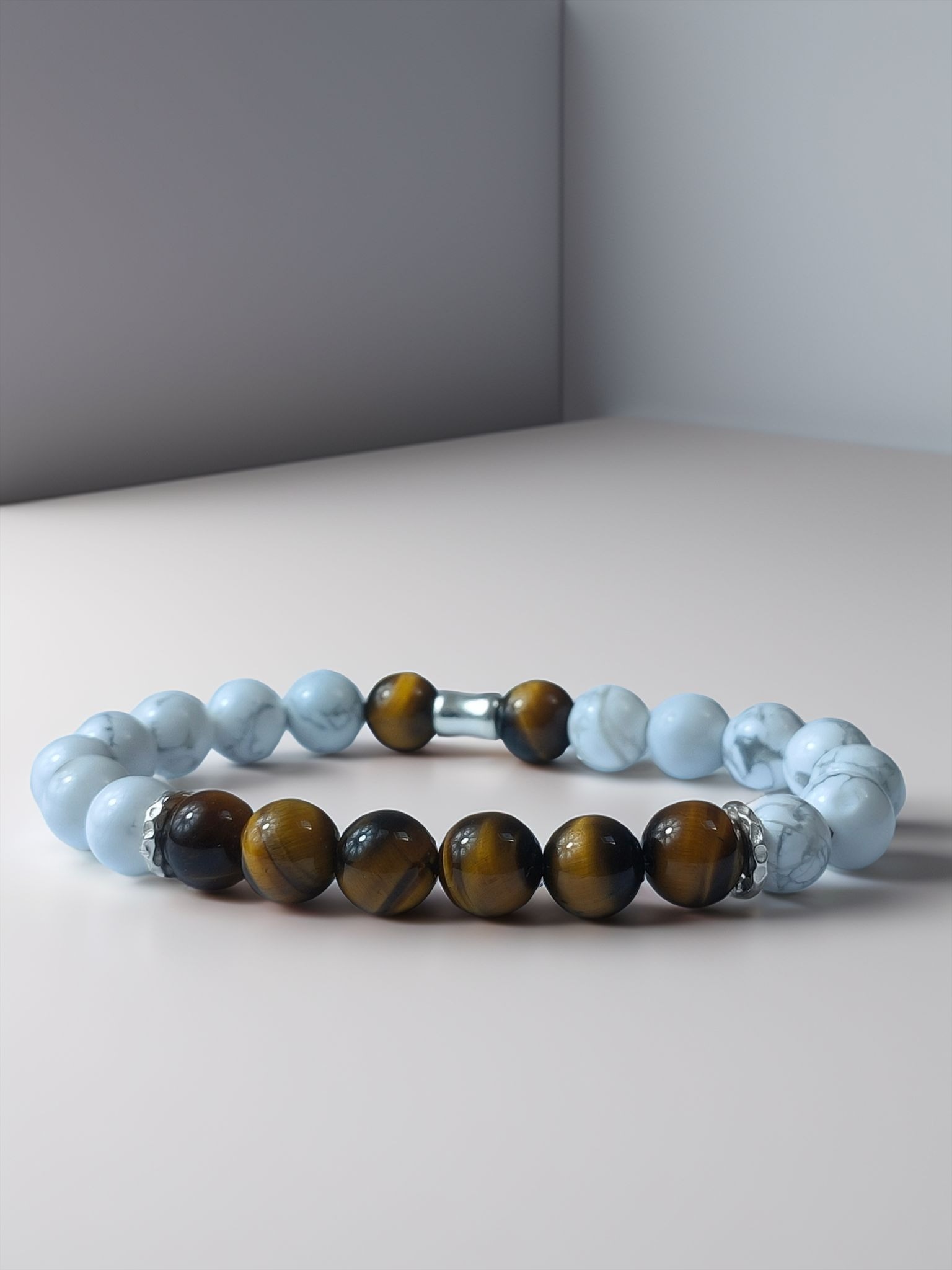 Accueil bracelet diurna invictus oeil de tigre howlite 1