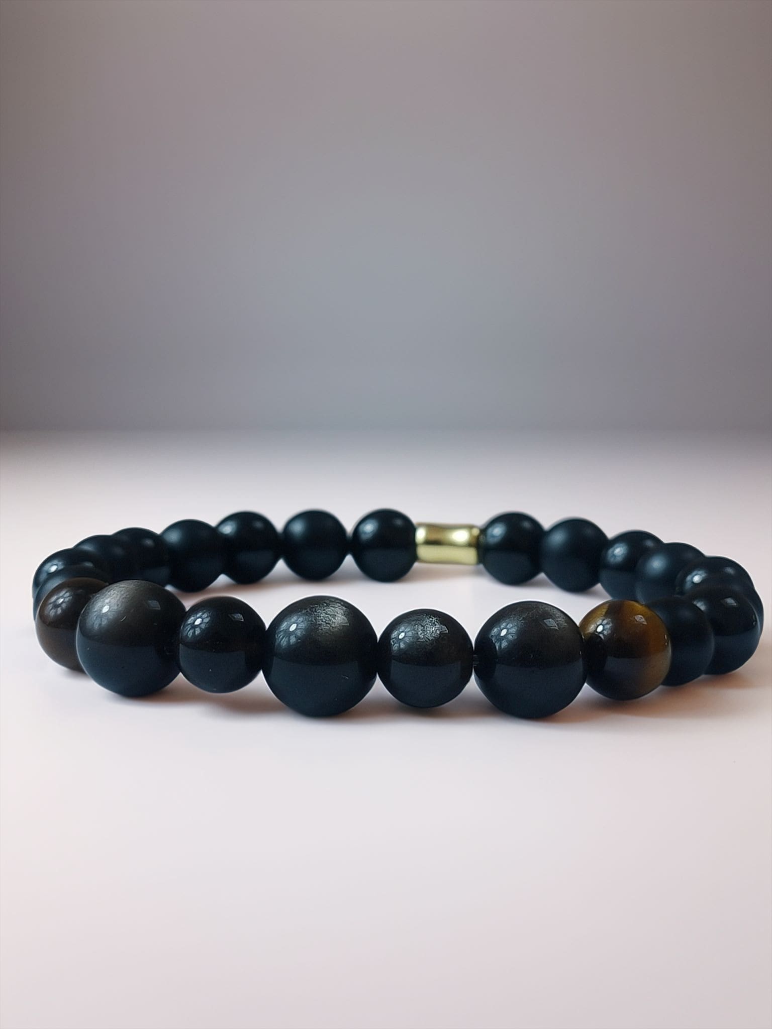 Accueil bracelet radiantis illustra oeil de tigre obsidienne onyx 2 min